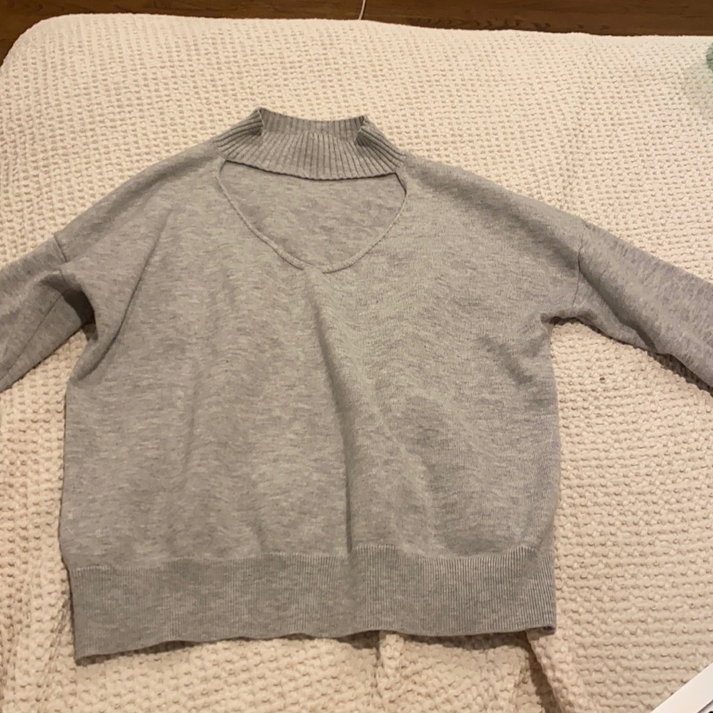grey soft sweater with cutout